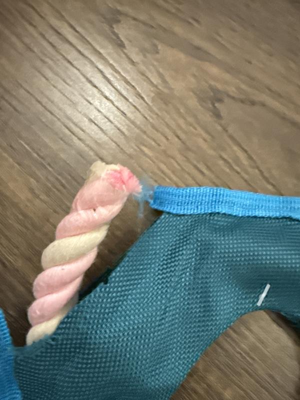 The rope was not even sewn it, it was just taped to the other sode