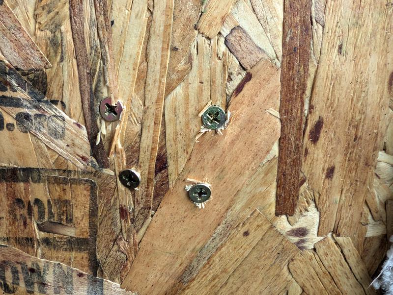 close-up on sticking out screws