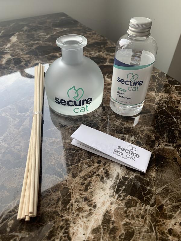 Contents of box. Unexpected logo on glass.