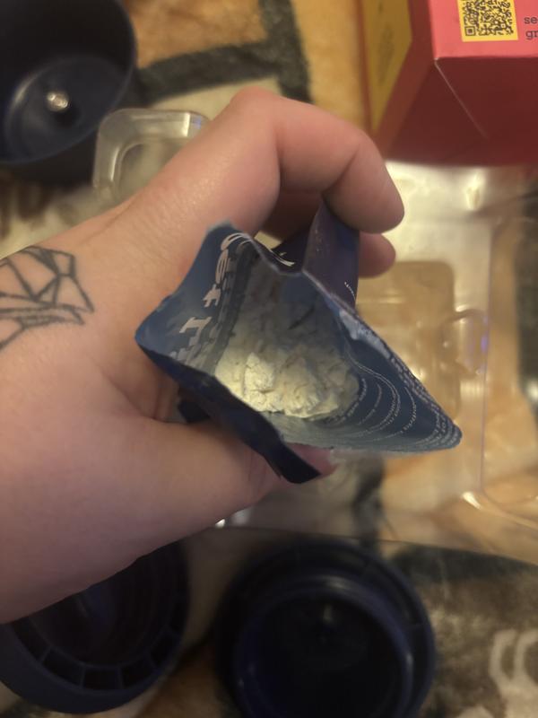 White powdered dry shampoo.