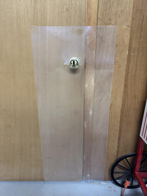 Door and frame with guard