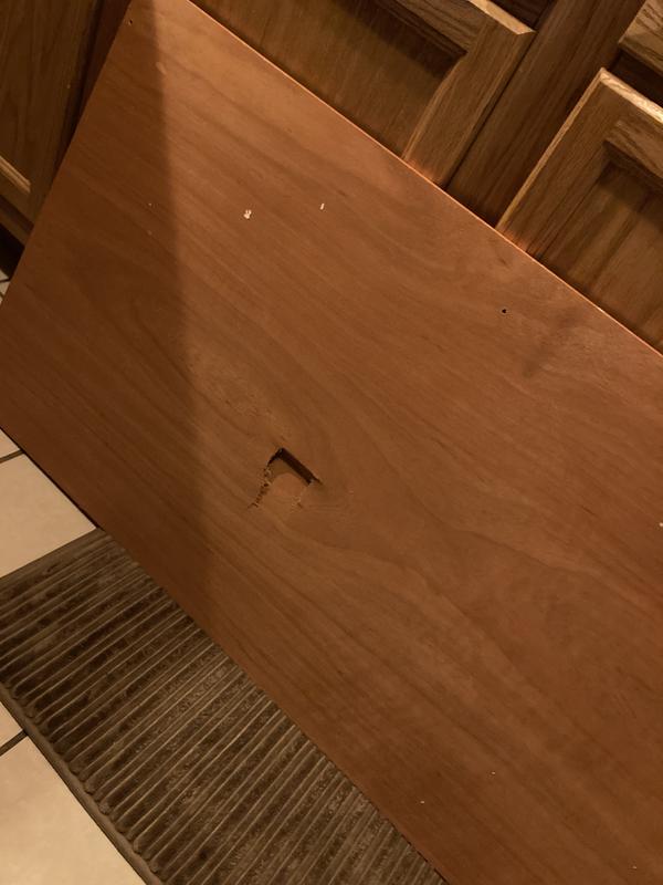 Came in the mail with a hole in the box and a hole in the backing