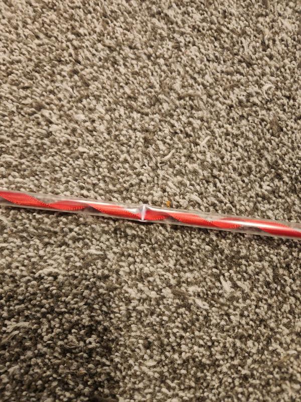 Plastic wand bent and crimped on first play