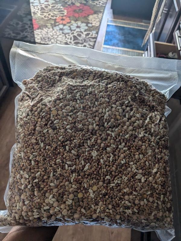 Aproximately 3 - 5 pounds of food that has been vacuum sealed after freezing.