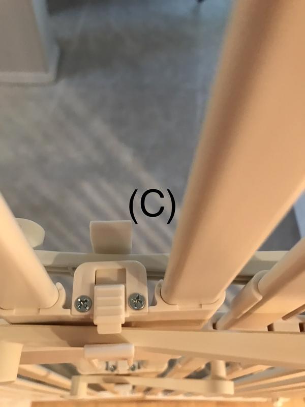 Fixing Pins with latch partially extended, slides back and forth.