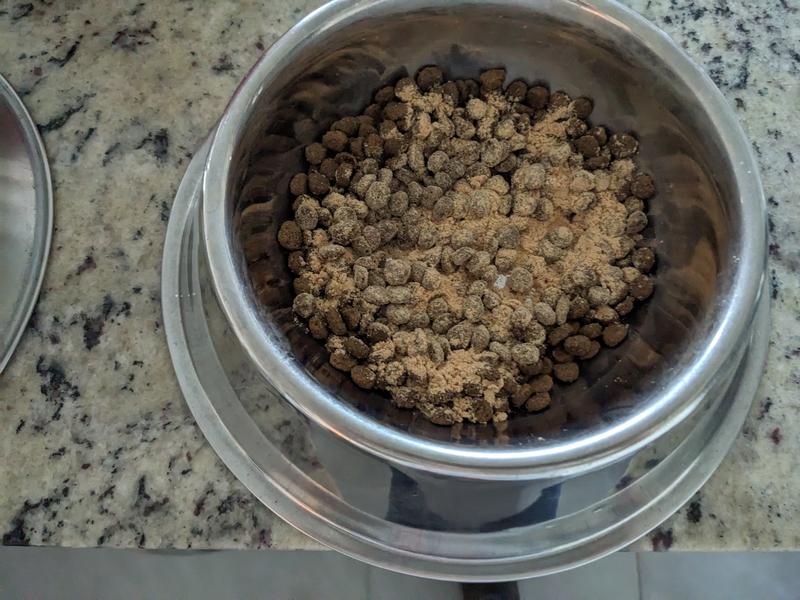 On top of dry food before water is added