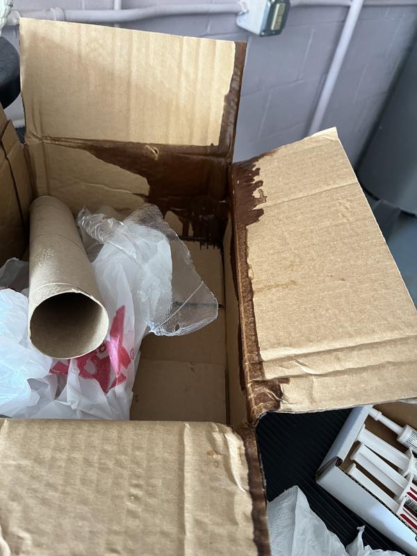 Box covered in shampoo, leakage