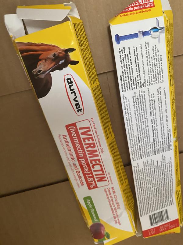 Crunch again.  Under cans of dog food