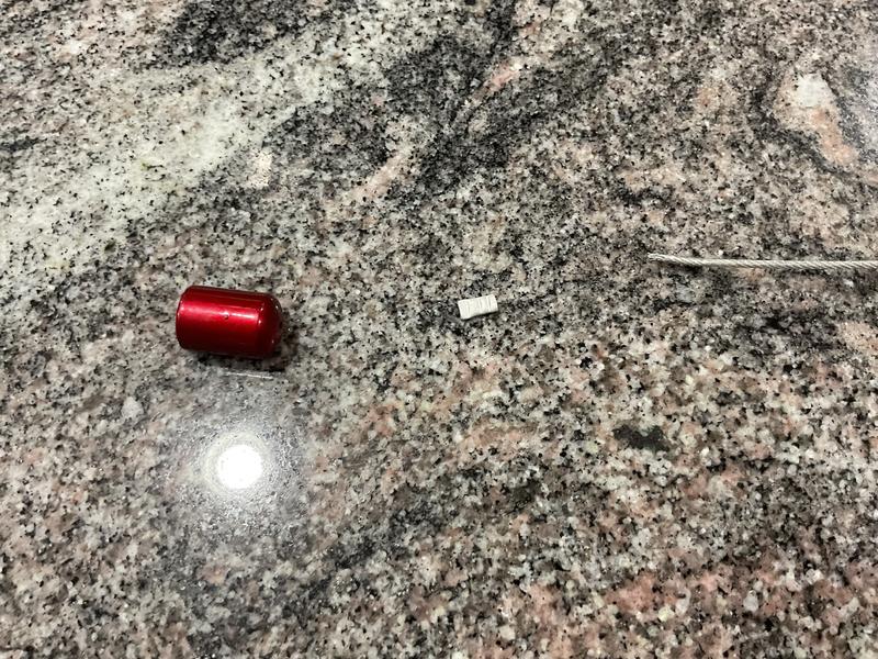 Wire pulled through.  Poor design