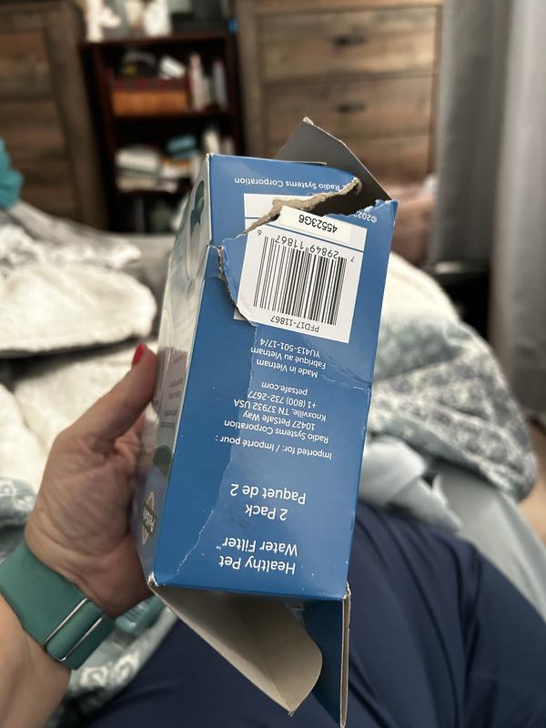 Box was broken open due to 40 lbs of bird feed on it