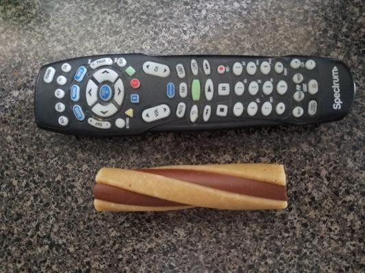 Next to an universal remote.