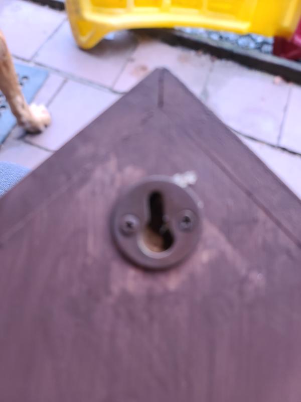 This is the plate which must be removed so that the screw or nail head can slide up to l9ck in place.