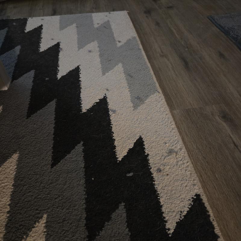 Pieces of rug on other rugs in the house