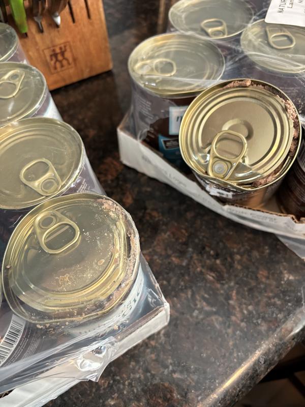 damaged package -- burst cans