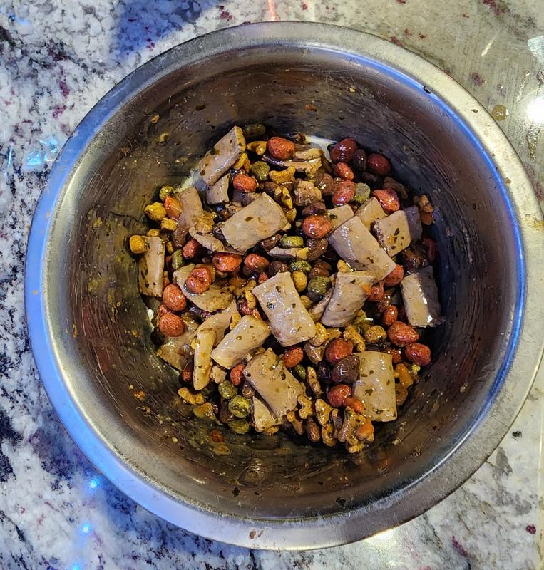 Big Chunks of meat and veggies with lots of broth to easily mix into dry food.