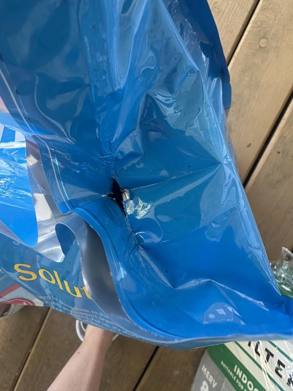 Tears where the bag comes together straight out of the box