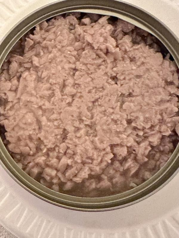 Food pictured in can.