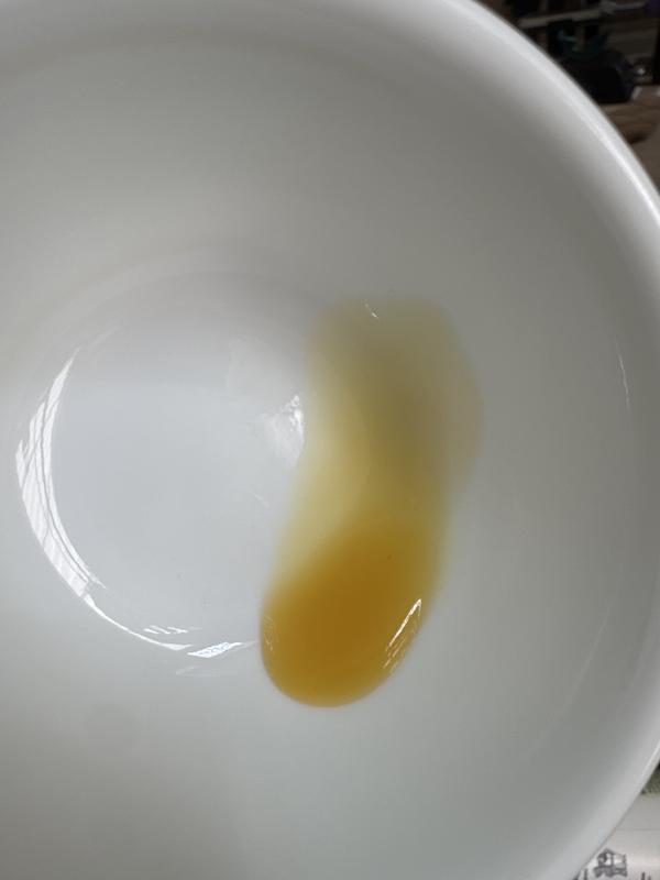 Yellow liquid for ear cleaning