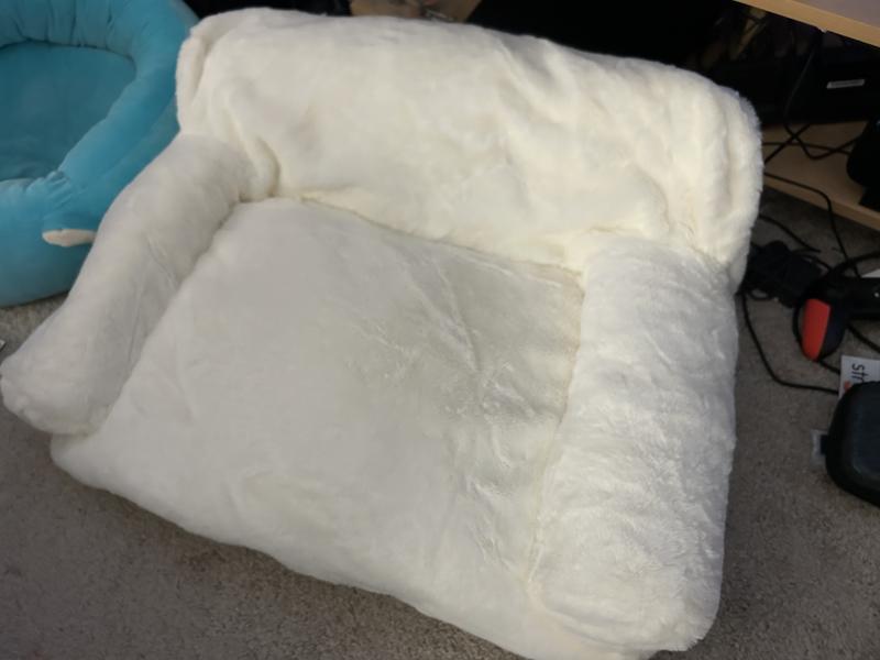 Even fully fluffed, cushions don’t fully fill out the cover