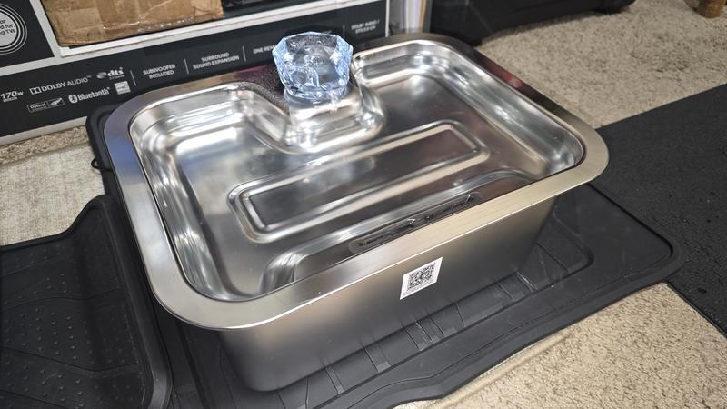 Water in the top tray is never completely replaced with water from the holding tank.