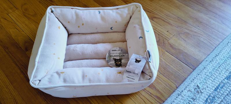 Close up of cute print and bed then with kitty for sizing. This bed was a size small and she is around 8 lbs