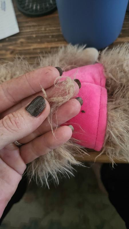 Here you can see the hair coming off the toy