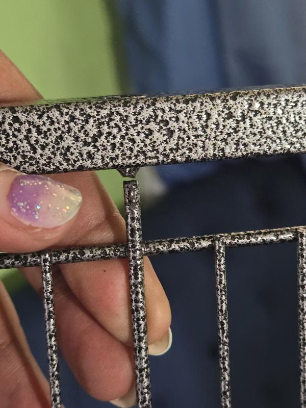 Metal bar at top separated