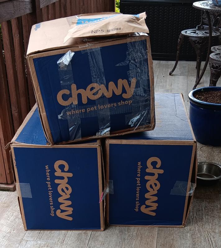 Side of box torn out of one, the other two were crushed