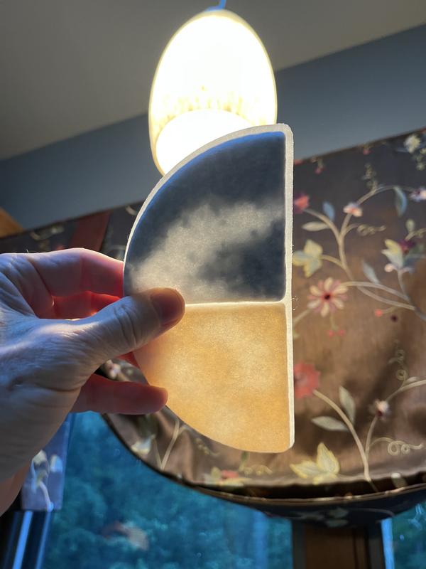 Very little carbon or resin in the filter. Large gaps where water flows through untreated. Original pad had more contents.