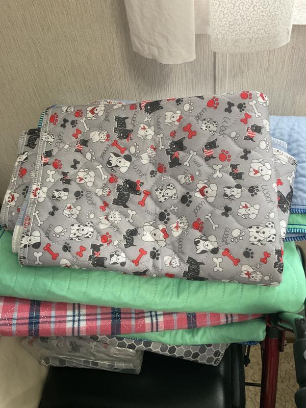 The pad on top is one of the new ones. I just throw in washing machine and hang on porch to dry.