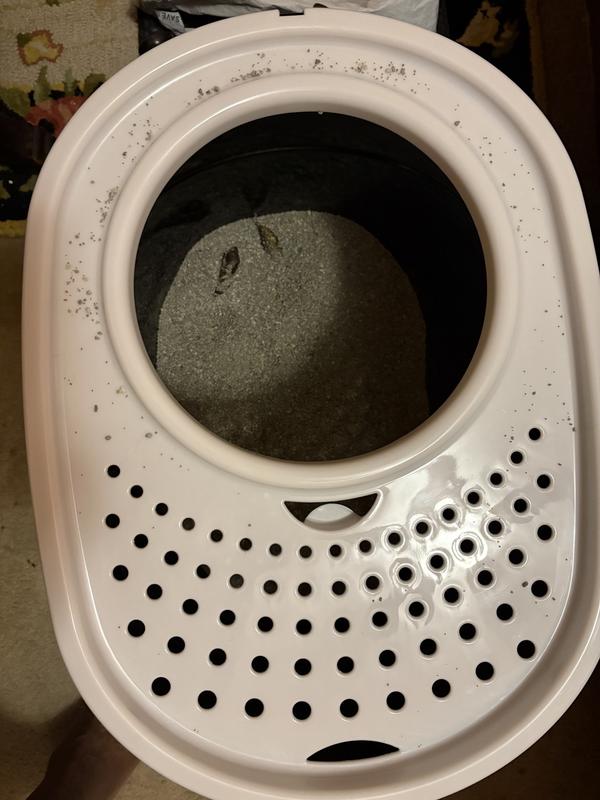 Litter debris trapped on the hood. Works to perfection.