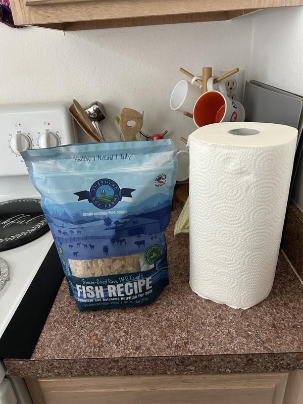 Size of 14oz bag next to roll of paper towel for sizing scale reference.