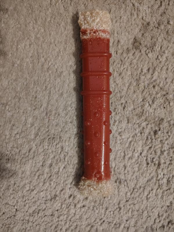 Toy after several weeks, the coating is chewed off the ends