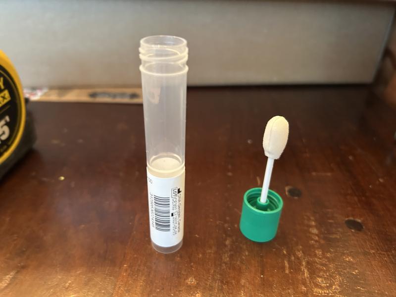 Should have purple fluid to preserve the swab during shipping.