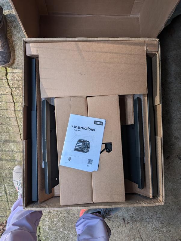 This is what it looks like coming out of the box - so assembly is definitely required. The instructions are photos only so it was a little confusing at times.