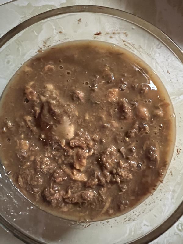 This is three cans of the food mixed in to one bowl (to add medicine to their food).  The chunks are so big, I have to break them down with a fork.  :)