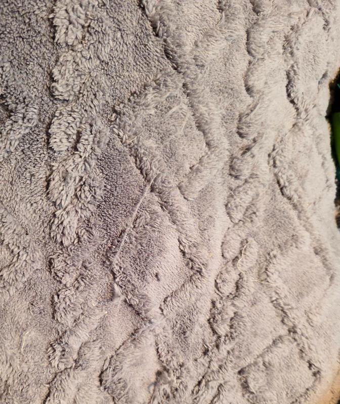 Lots of pulls, snags loose fuzz.