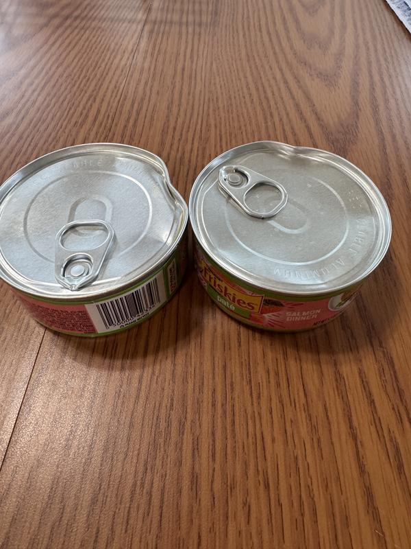 2 cans dented, including the one with the slit