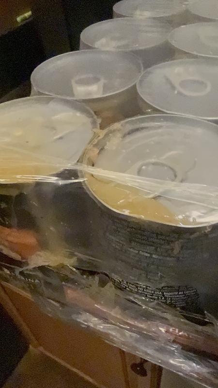 Dented cans, squished cans the tops aren’t even sealed on it