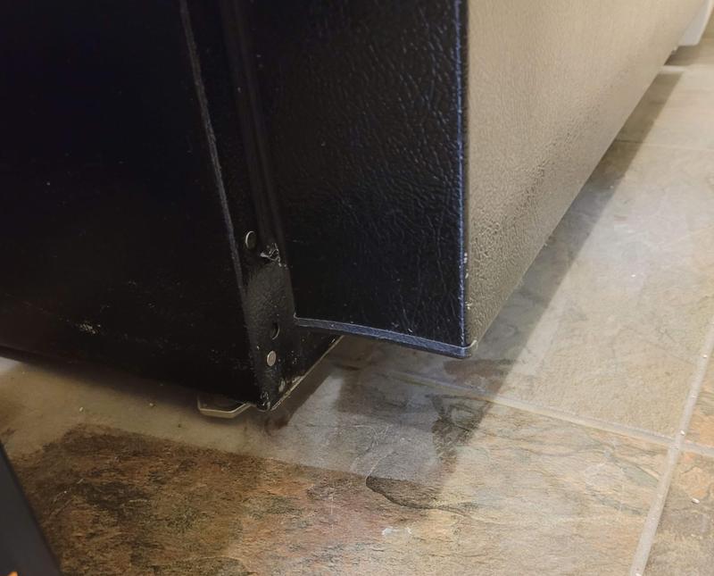 Dusty floor & refrigerator