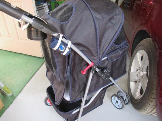 Toto Poop Bag Dispenser attaches nicely to our dog stroller.