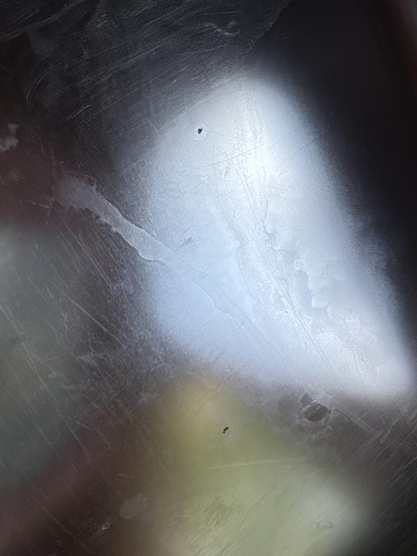 Solid stainless doesn’t have black scratches