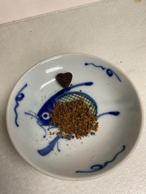 Pulverized vitamin then mixed with canned dog food