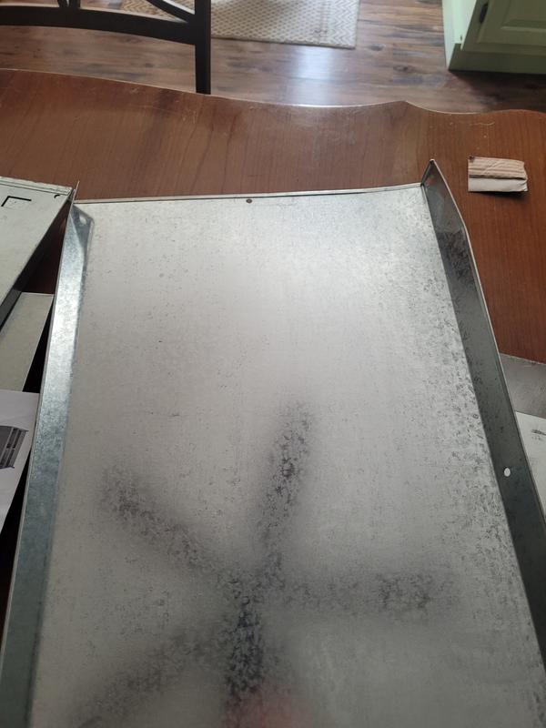 Small dent on roof panel