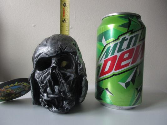 Next to soda can for size (about 4" tall)
