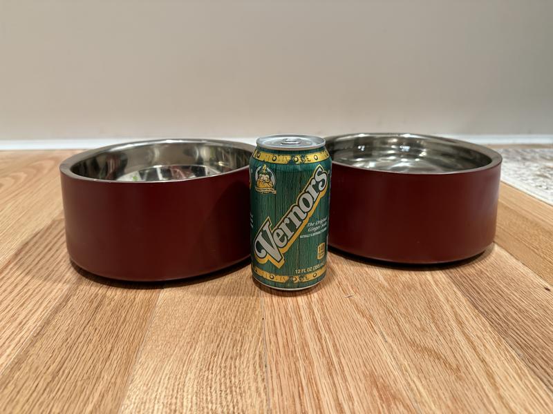 Next to regular soda can for size comparison