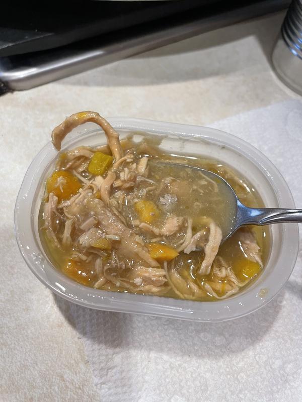 You can clearly see the pieces of meat and veggies in the gravy