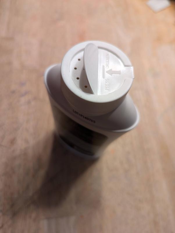 Cap needs bigger dispensing holes, but clever design otherwise.