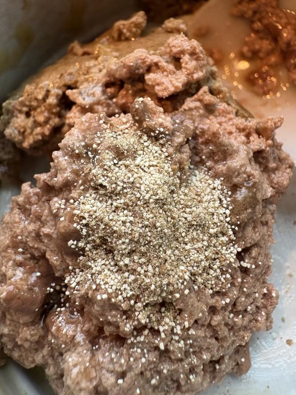 Sprinkled over wet food