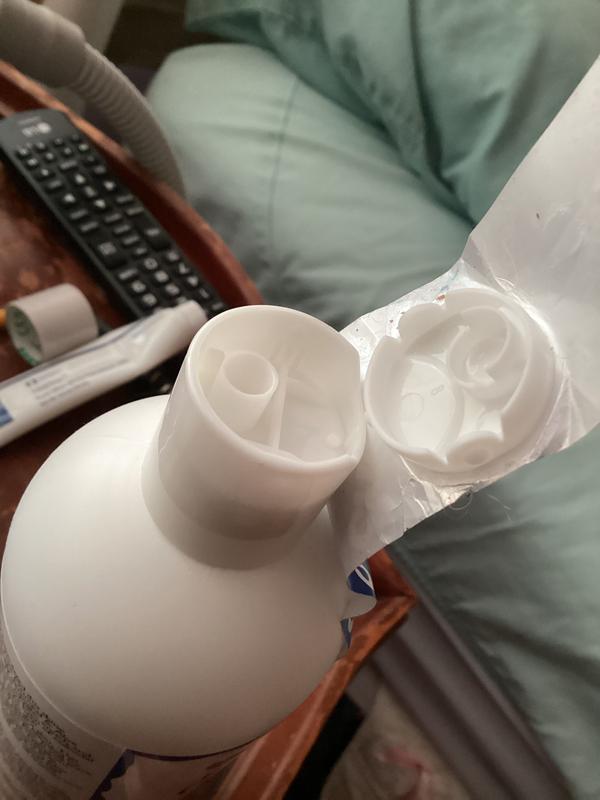 Broken cap when tape removed.